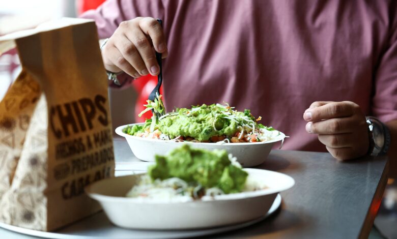 Chipotle hikes same-store sales forecast, says cyclospora fears hit sales in late July