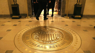 Treasury yields are little changed as investors await key inflation data