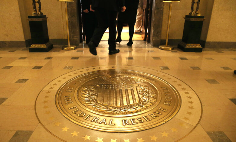 Treasury yields are little changed as investors await key inflation data