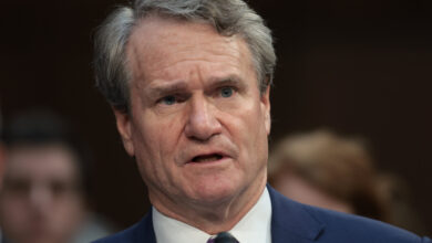 Bank of America expects third-quarter investment banking fees to fall more than 10%; shares slide
