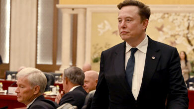 Tesla beats on earnings and sales even as auto revenue declines