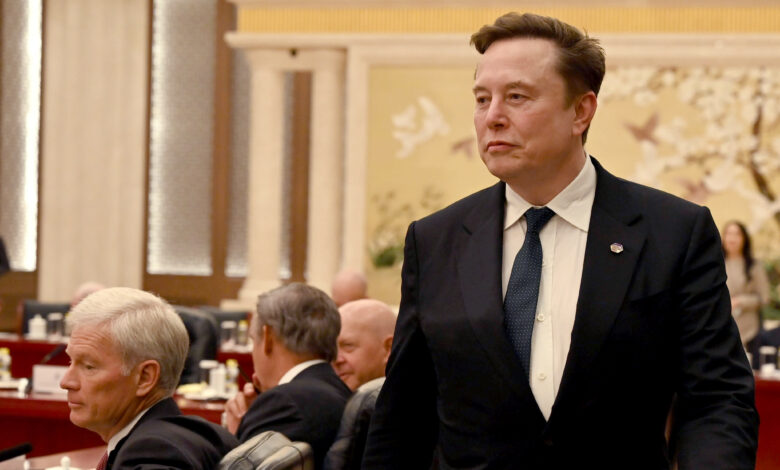 Tesla beats on earnings and sales even as auto revenue declines