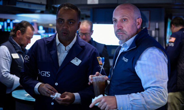 Treasury yields are lower after reaching multiyear highs, traders weigh latest bond auction