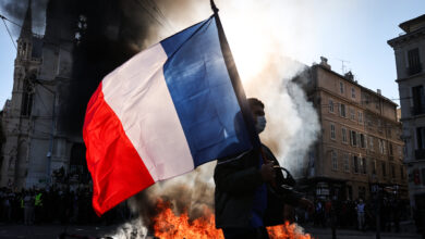 French 10-year bond yield hits 5% for first time since 2002 amid unrest