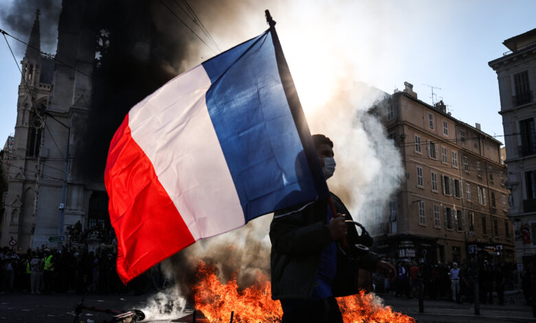 French 10-year bond yield hits 5% for first time since 2002 amid unrest