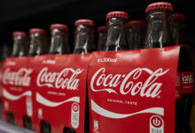 Coca-Cola hikes earnings outlook, even as it sees lackluster demand in North America