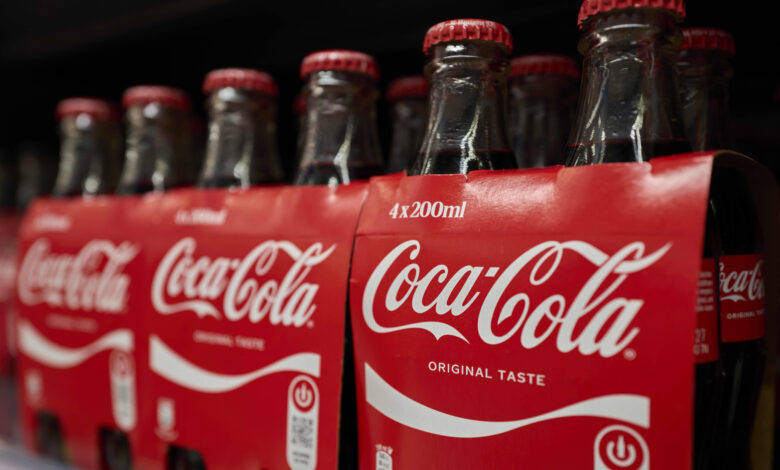 Coca-Cola hikes earnings outlook, even as it sees lackluster demand in North America